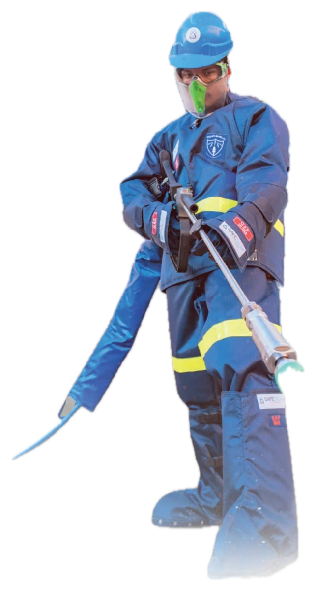 Operator in a Safetech UAP Ultra suit with a water jetting gun